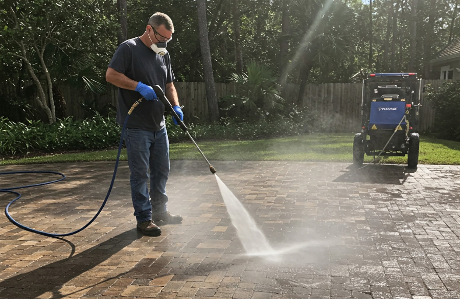 Paver Pressure Washing house with shingles in Central Florida